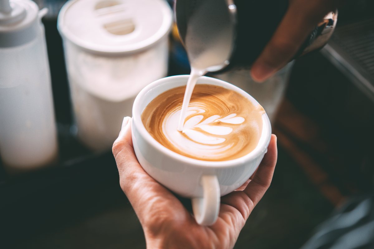 A cafe photo with a warm orange color cast from the indoor lighting.